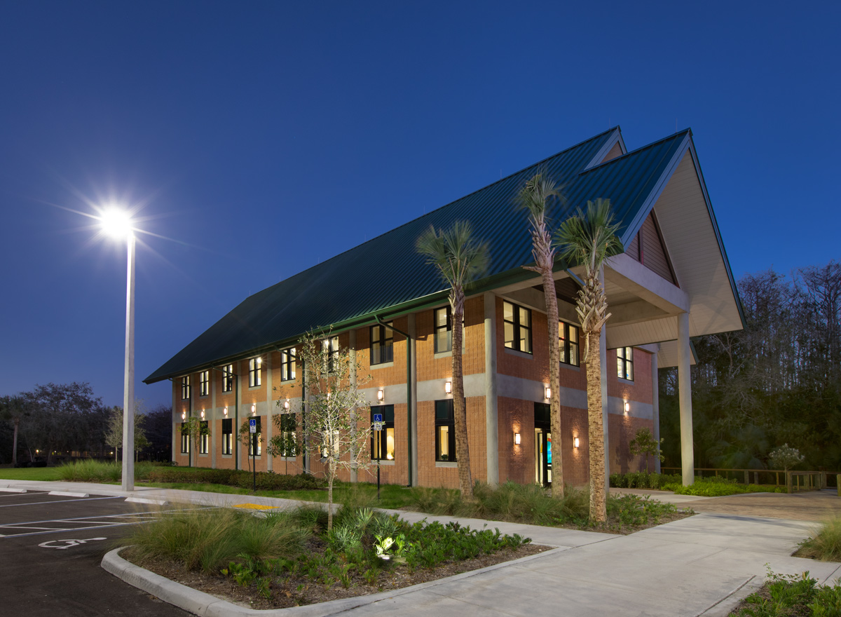 Architectural dusk view of the Abiaki Tribal Historic Preservation HQ in Clewiston, FL