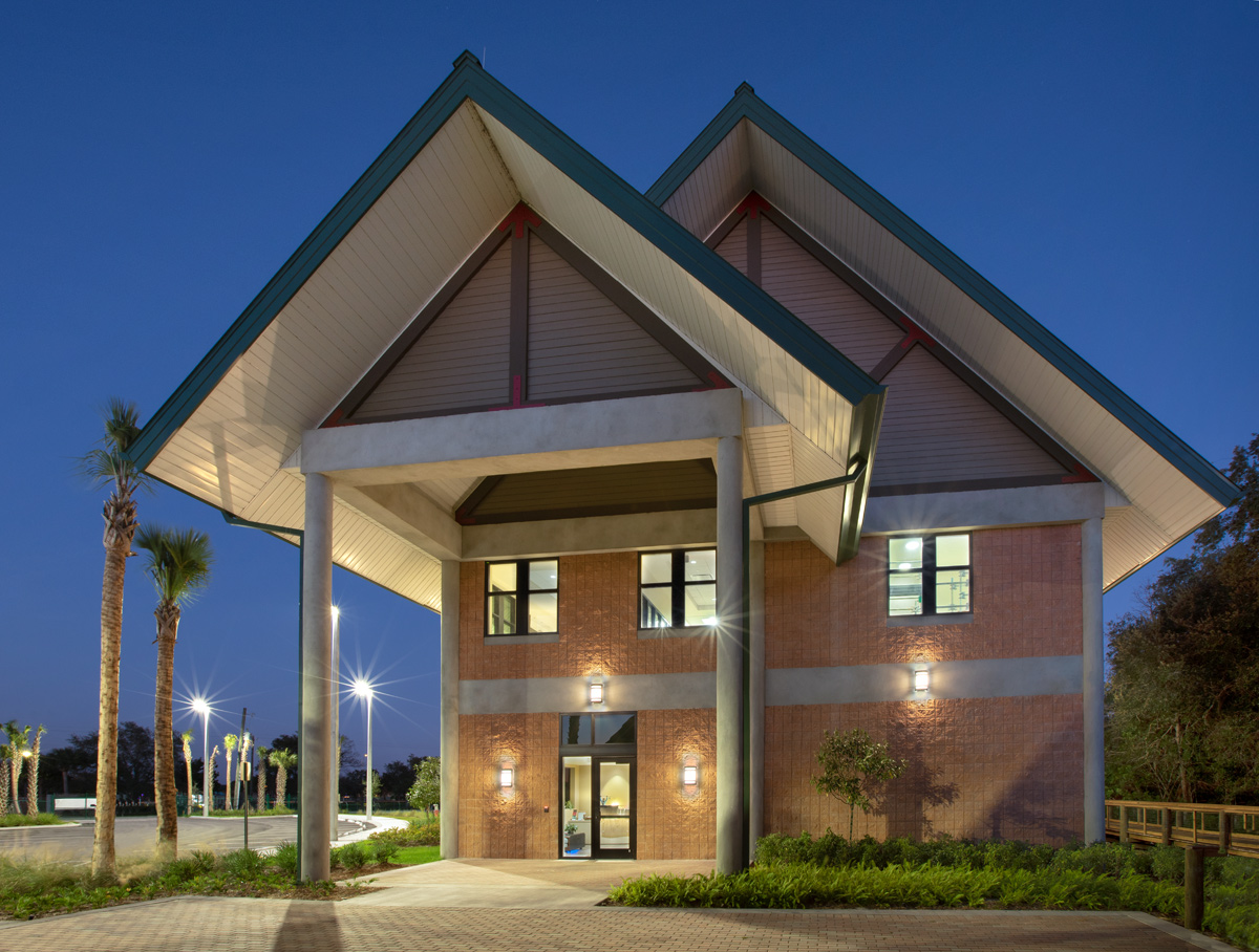 Architectural dusk view of the Abiaki Tribal Historic Preservation HQ in Clewiston, FL