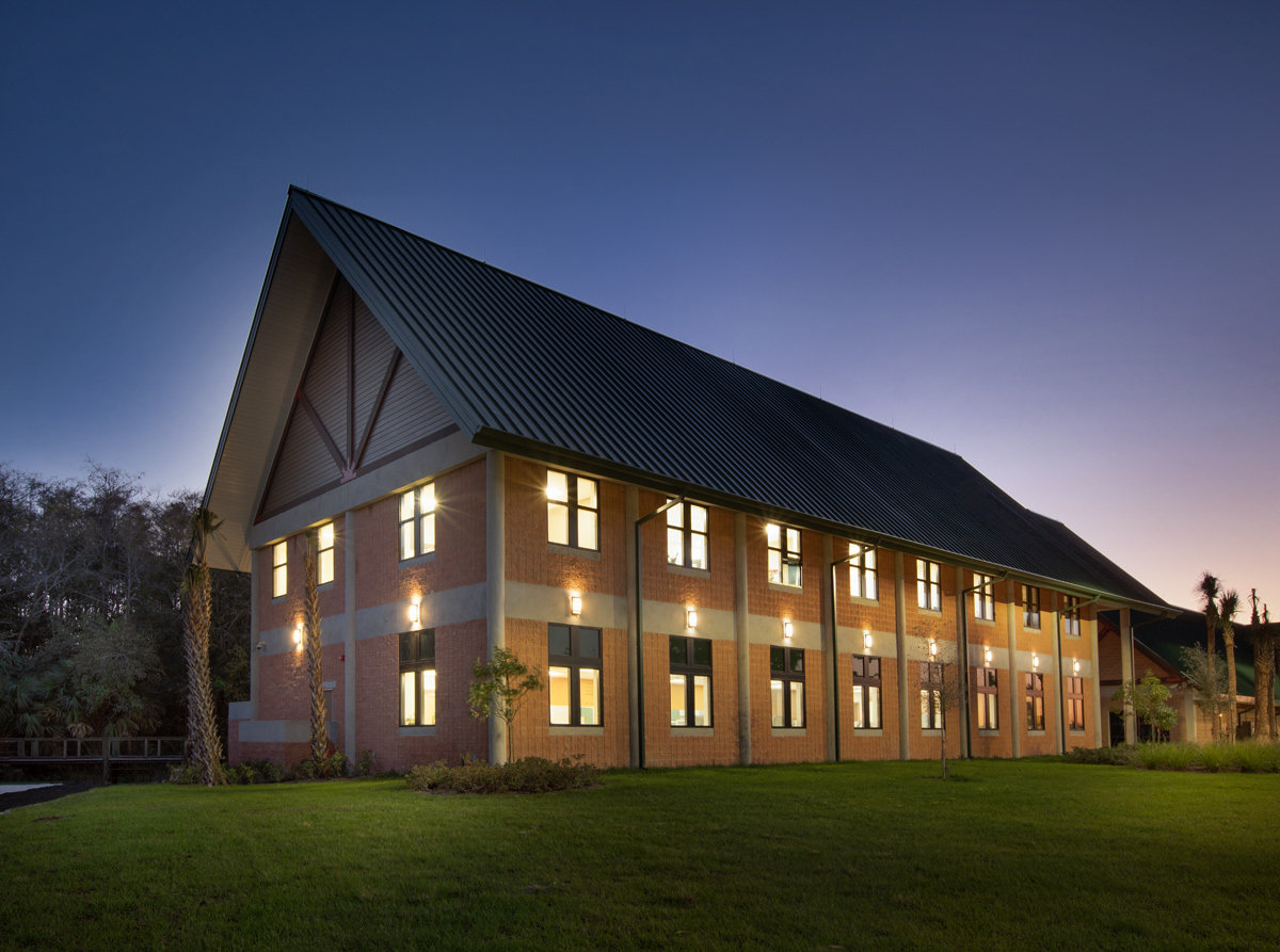 Architectural dusk view of the Abiaki Tribal Historic Preservation HQ in Clewiston, FL