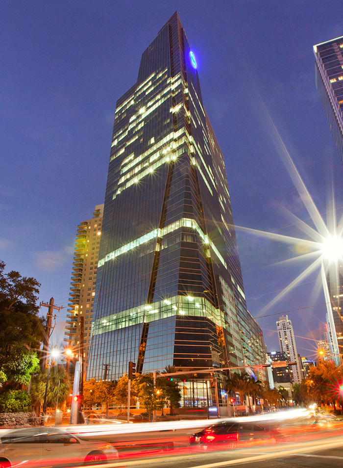 Architectural dusk view of 1450 Brickell office tower.