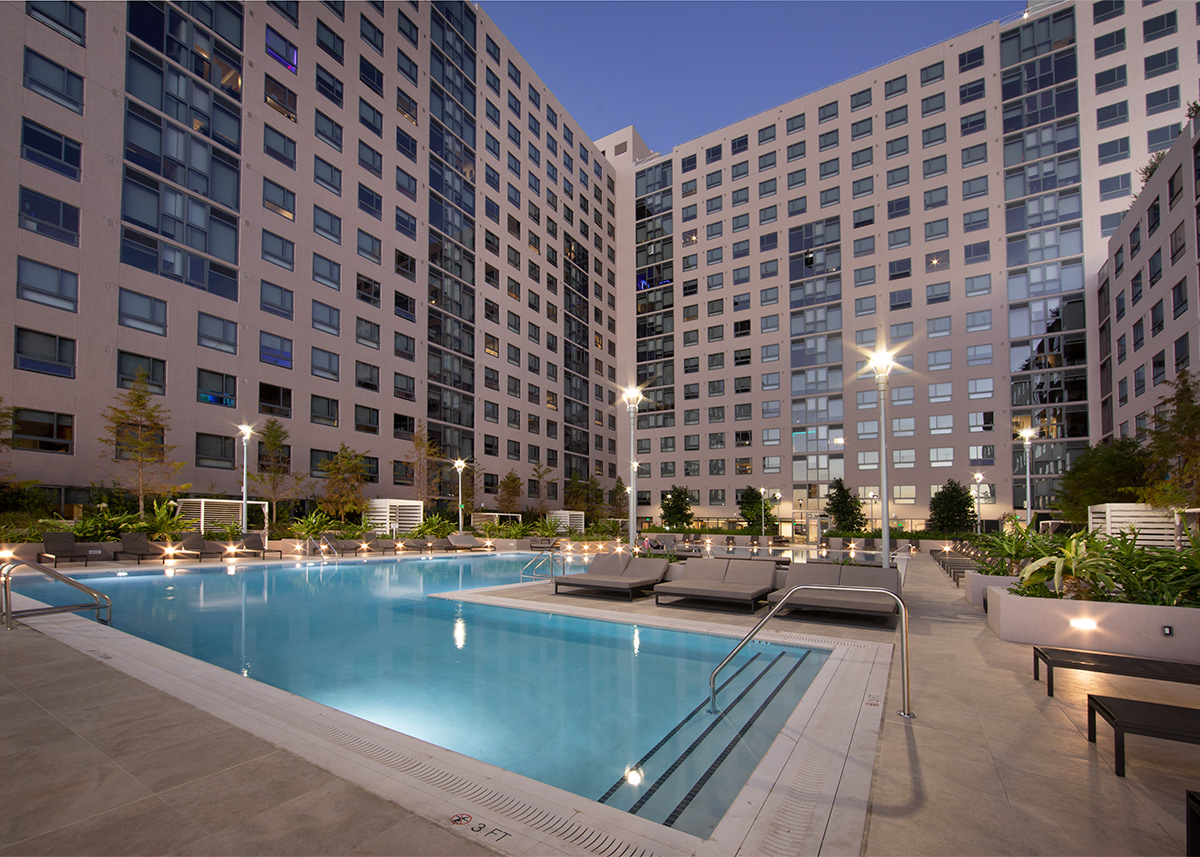 FIU Miami One student housing pool deck at dusk,