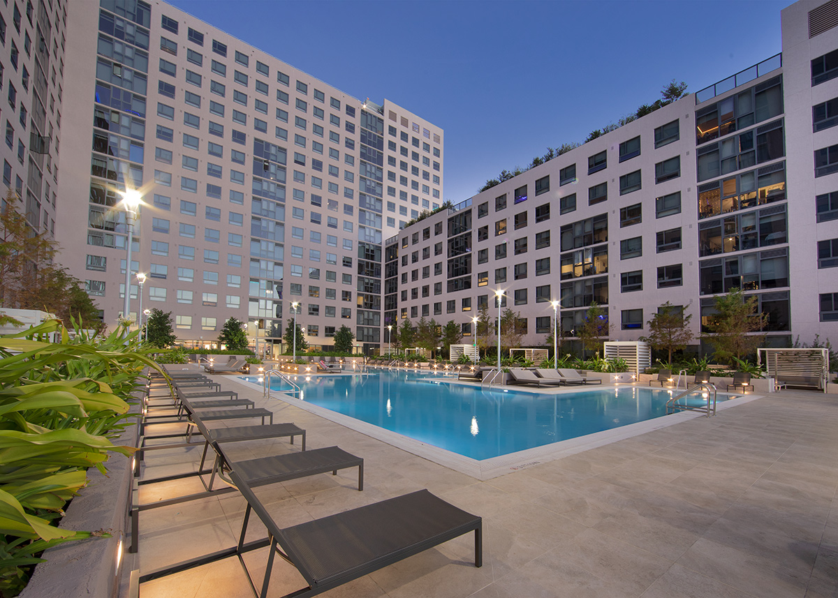 FIU Miami One student housing pool deck at dusk,