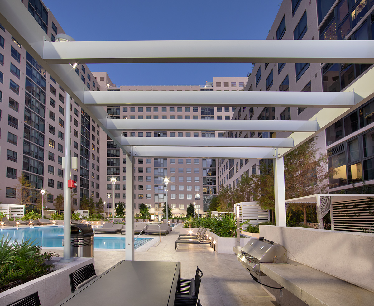 FIU Miami One student housing pool deck at dusk,