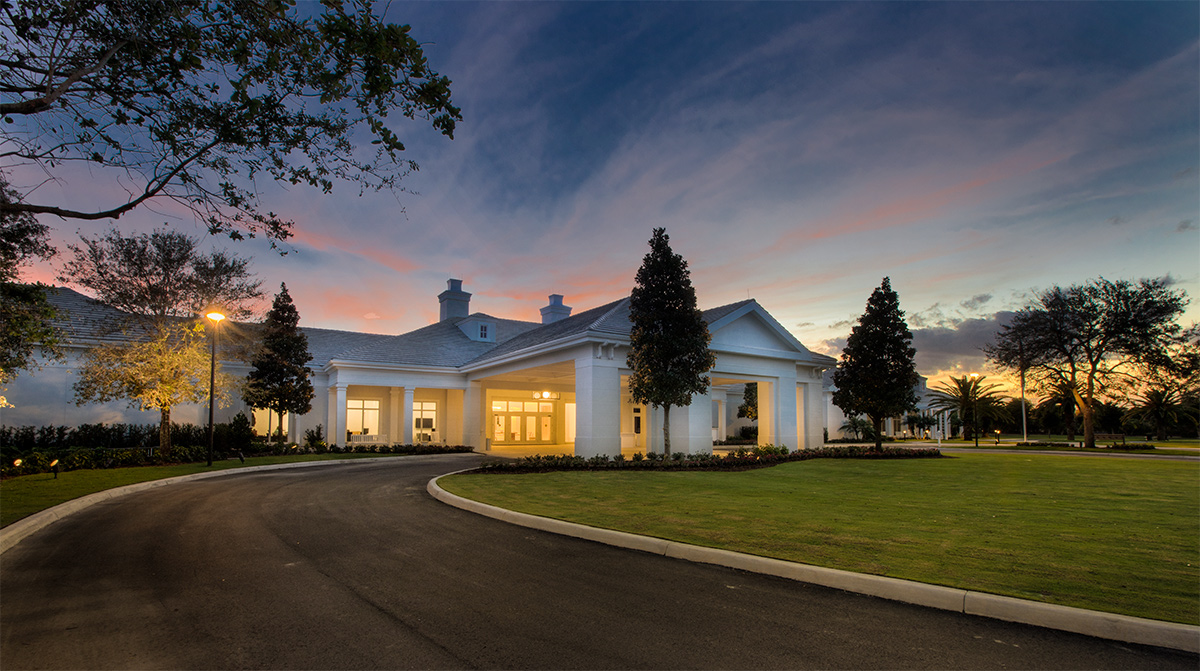 High Ridge Country Club Boynton Beach clubhouse view at dusk.