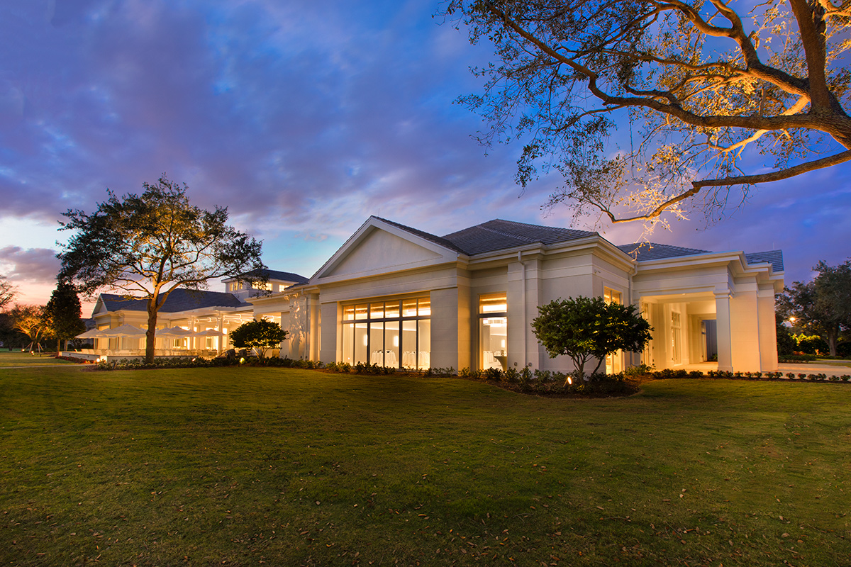 High Ridge Country Club Boynton Beach clubhouse view at dusk.