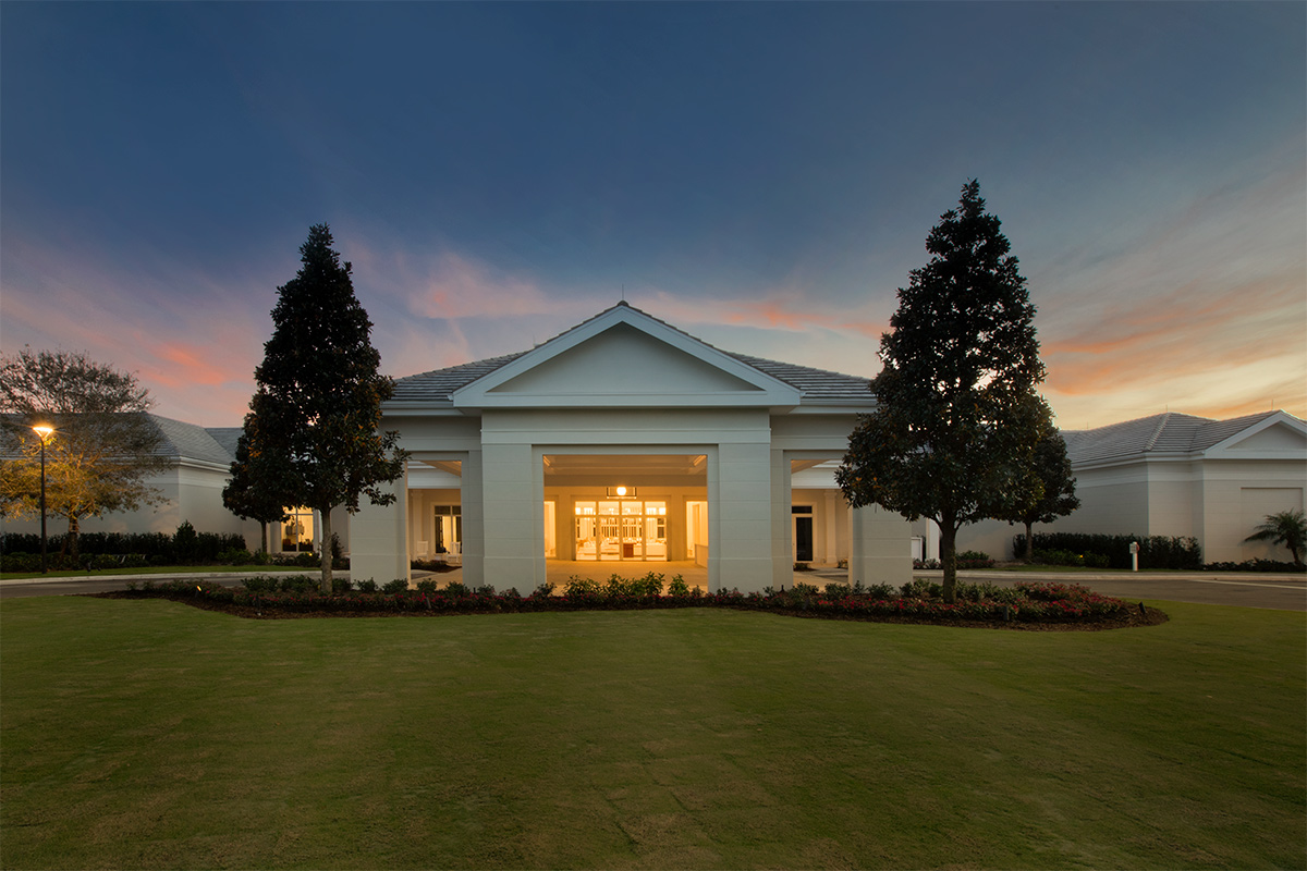 High Ridge Country Club Boynton Beach clubhouse view at dusk.