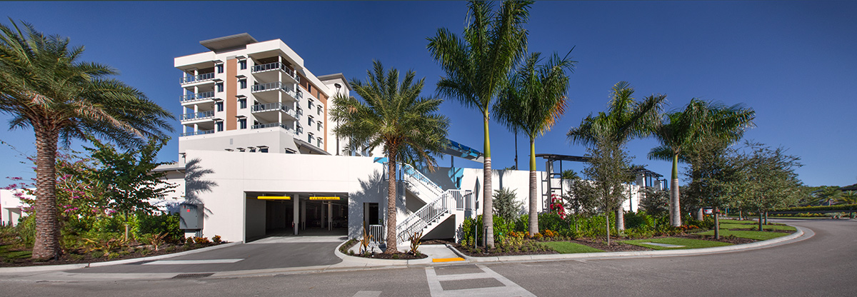 Architectural garage view of Moorings Grand Lake Clubhouse - Naples, FL.