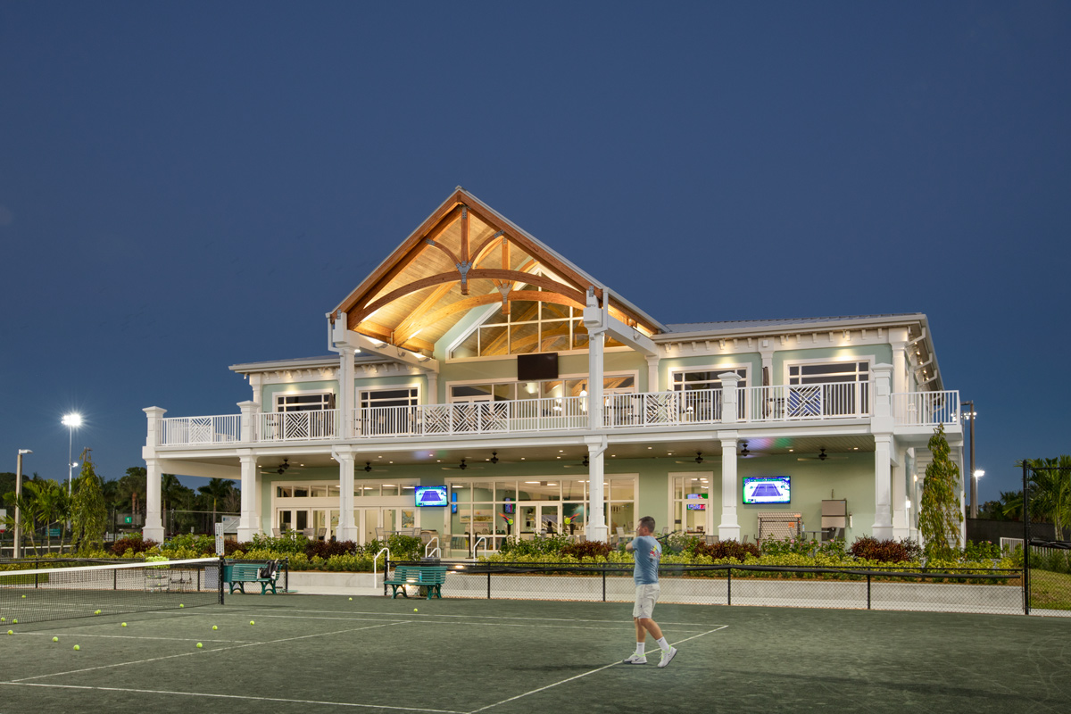 Architectural dusk view of the Palm Beach Gardens, FL tennis clubhouse.