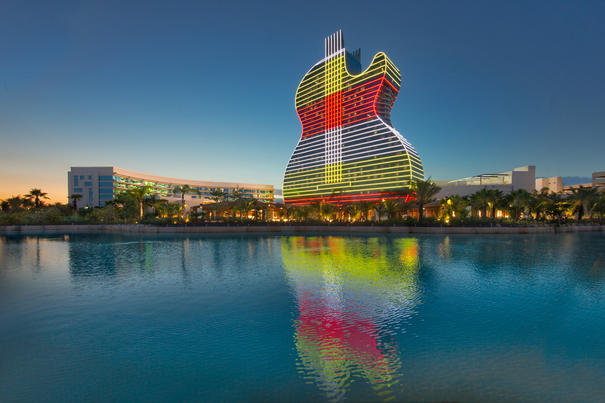 Architectural dusk view of the Hard Rock Hollywood guitar hotel.