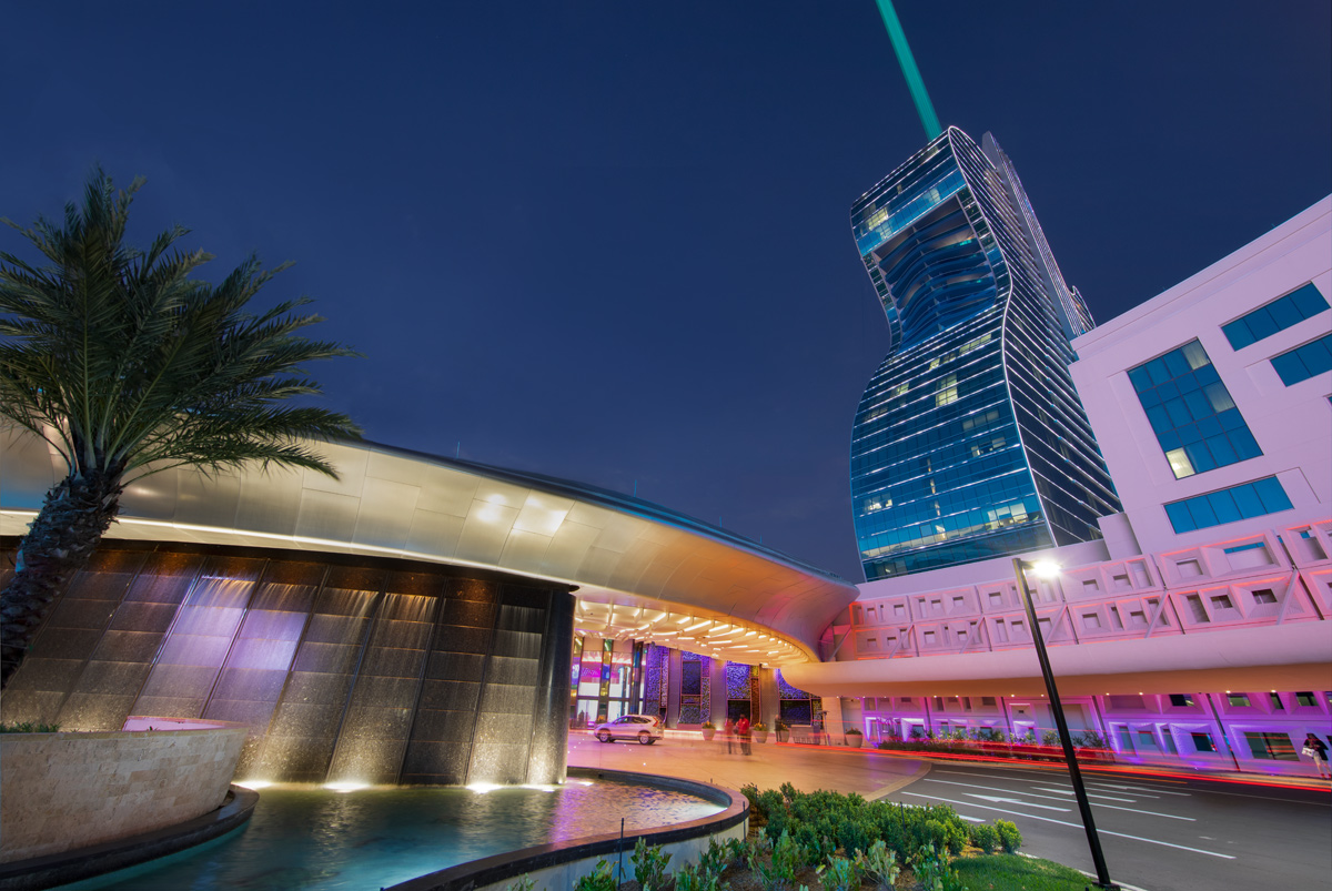 Architectural dusk view of the Hard Rock Hollywood guitar hotel entrance.