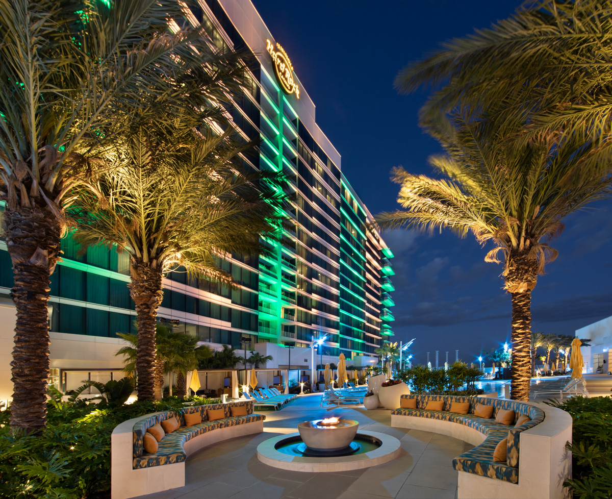 Hard Rock hotel and casino Tampa architectural dusk view from pool.