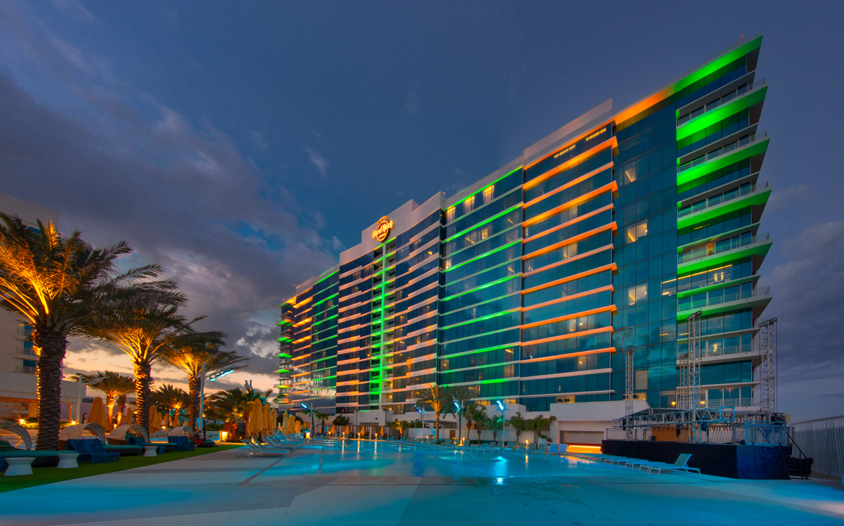 Hard Rock hotel and casino Tampa architectural dusk view from pool.