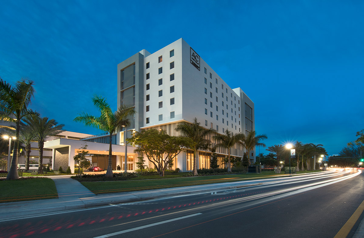 Architectural dusk view of the AC Hotel entrance Aventura, FL