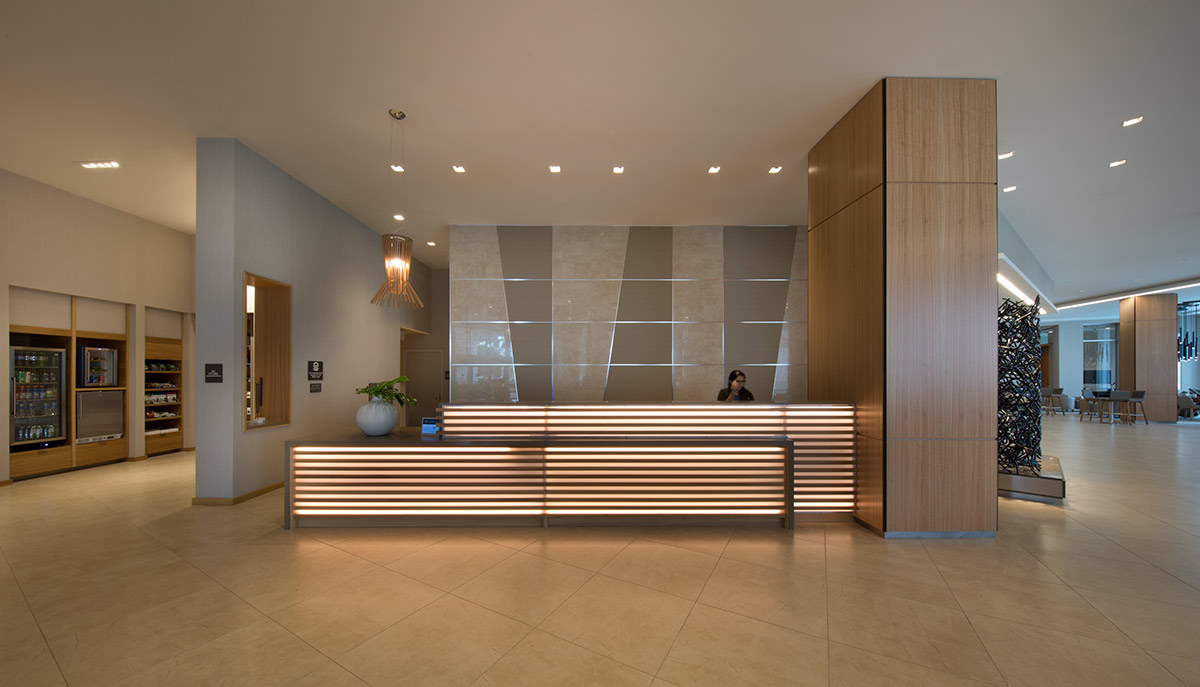 Interior design view of the reception lobby at AC Hotel Aventura, FL.