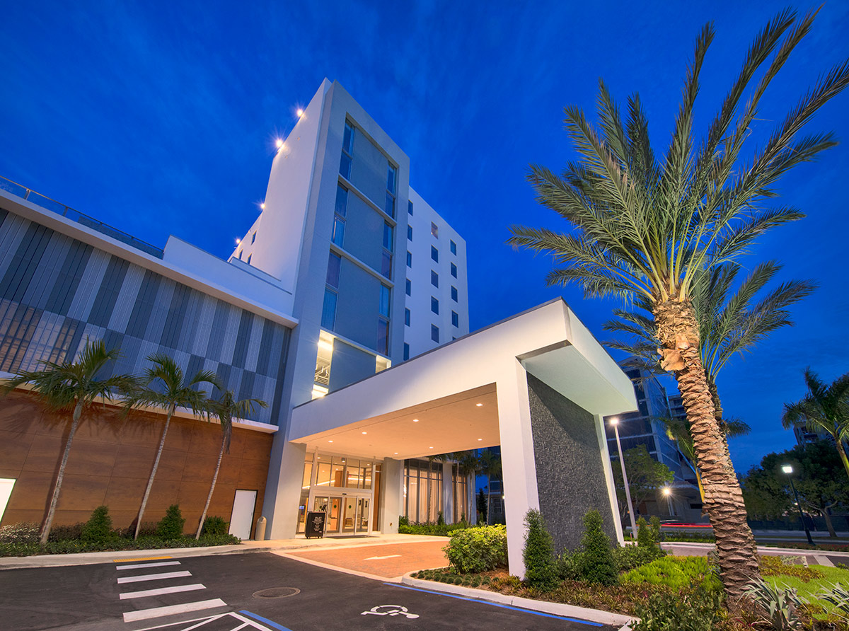 Architectural dusk view of the AC Hotel entrance Aventura, FL