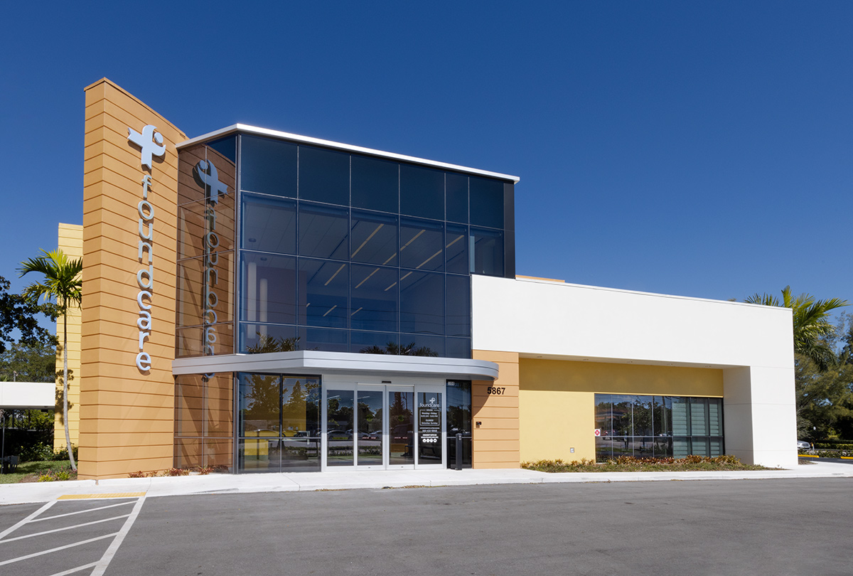 Architectural entrance view of the Foundcare clinic in  West Palm Beach, FL.