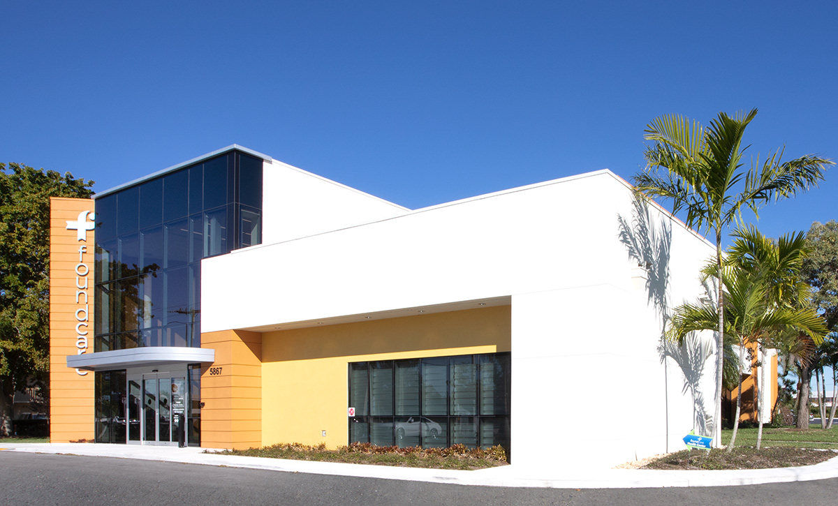 Architectural entrance view of the Foundcare clinic in West Palm Beach, FL.