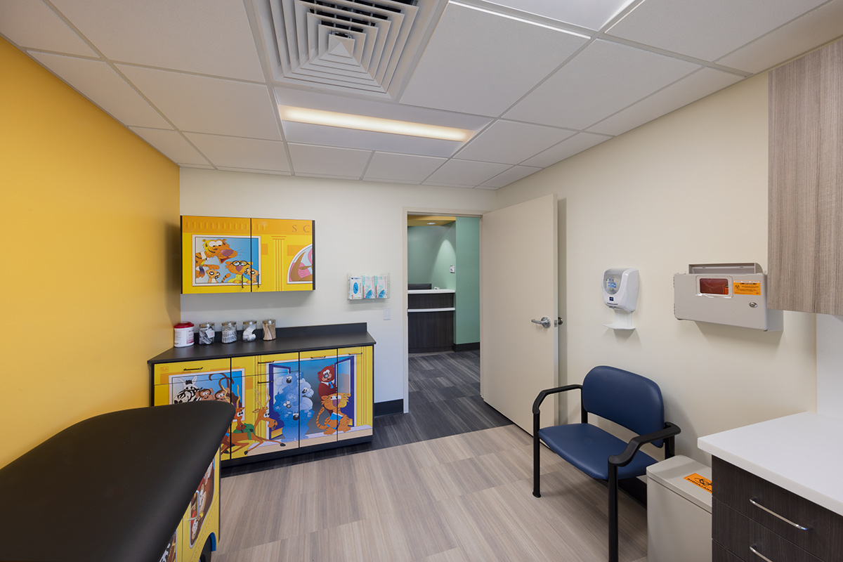 Interior design view of the Foundcare clinic pediatric treatment room in West Palm Beach, FL.