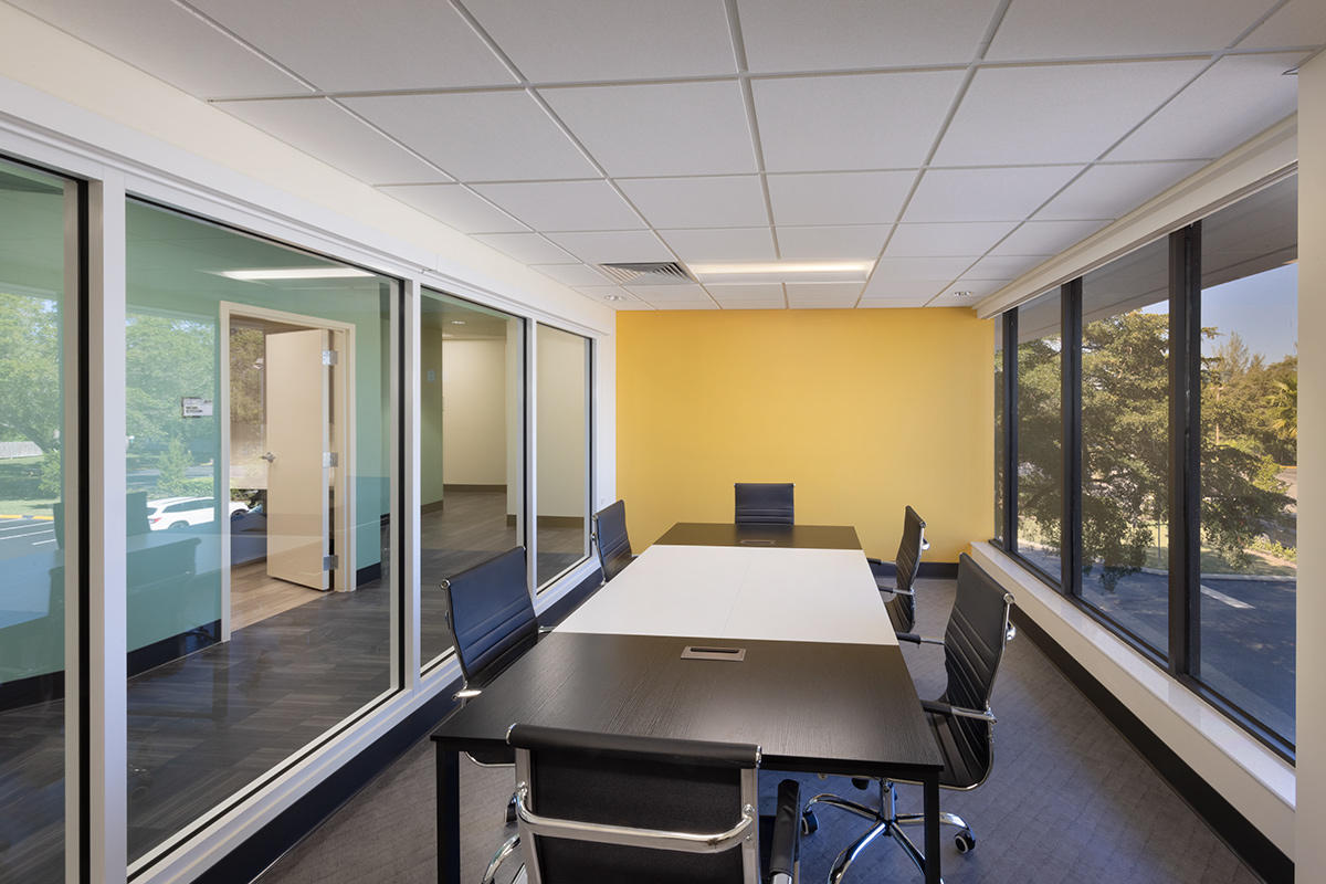 Interior design view of the Foundcare clinic conference room in West Palm Beach, FL.