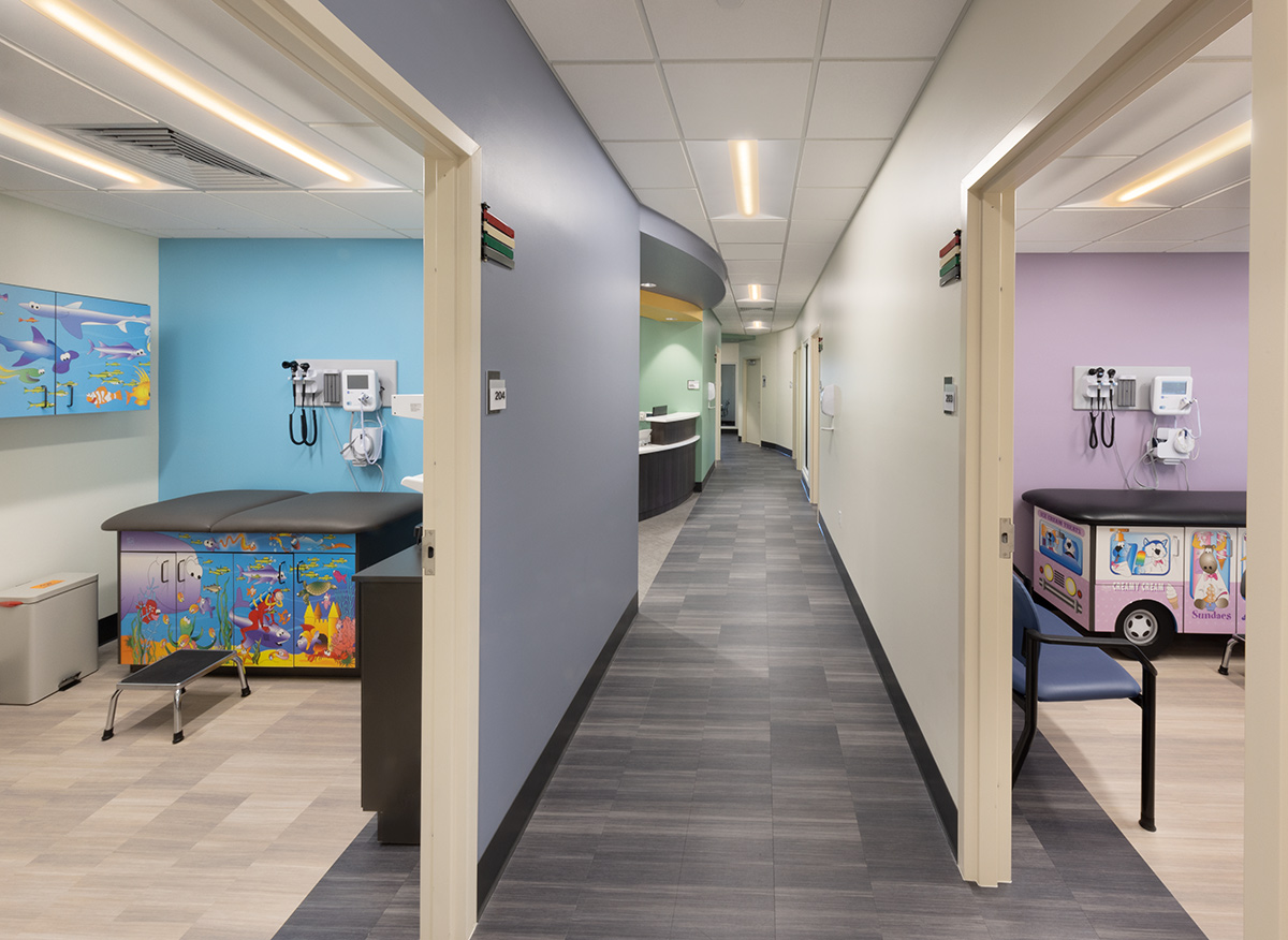 Interior design view of the Foundcare clinic pediatric treatment rooms and corridor in West Palm Beach, FL.