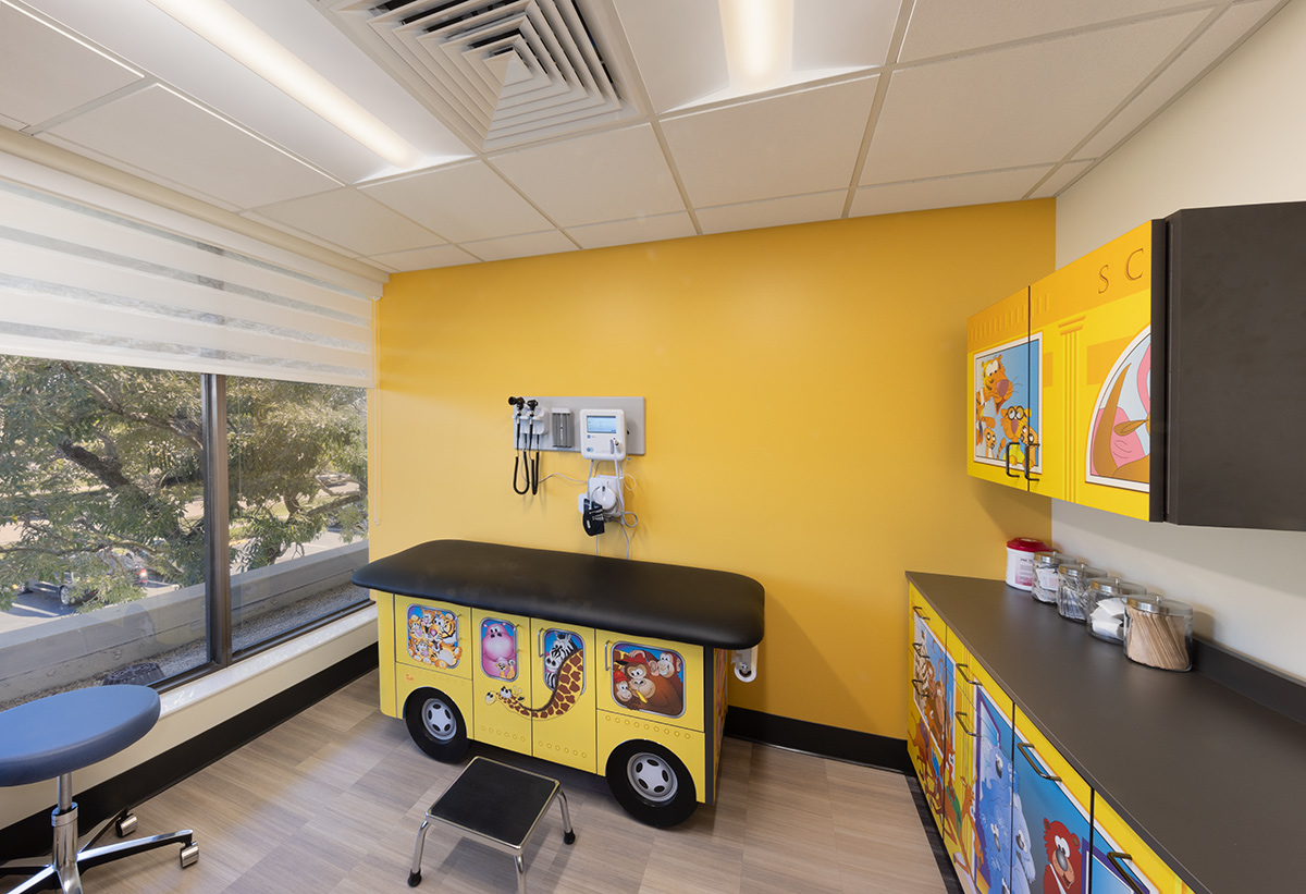 Interior design view of the Foundcare clinic pediatric treatment room in West Palm Beach, FL.