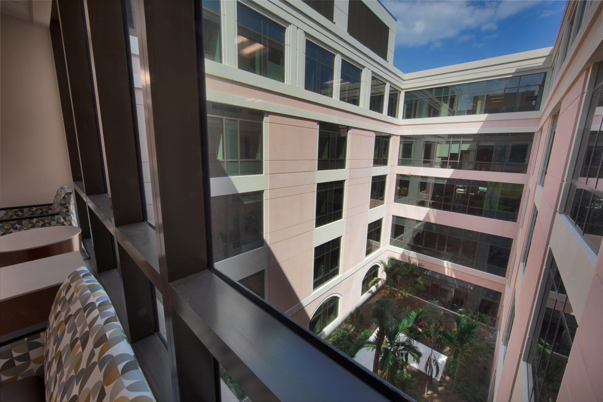 The Baptist East medical bed tower waiting area overlooking courtyard delivering healthcare in Miami.