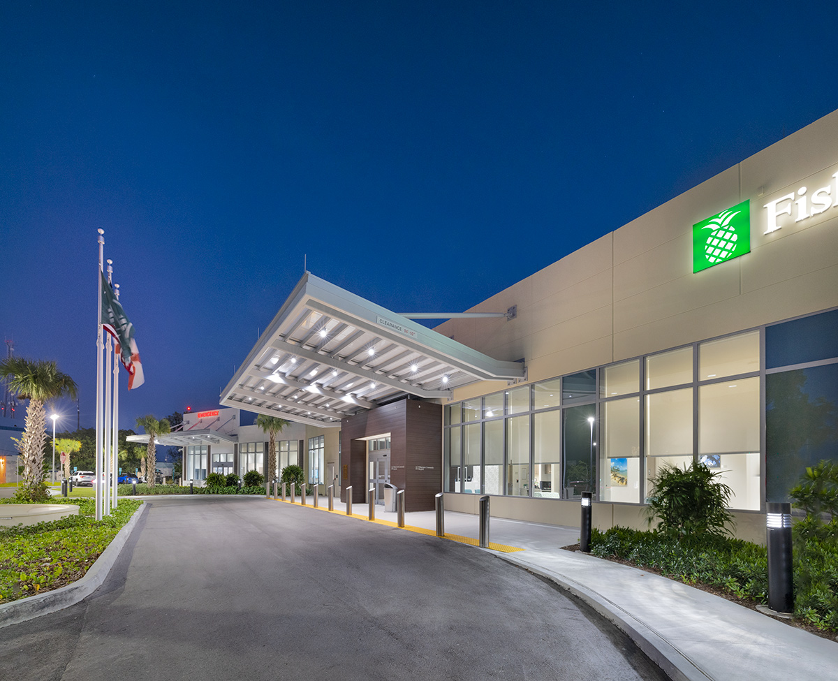 Architectural dusk entrance view of Baptist Fishermen's Community Hospital in Marathon, FL