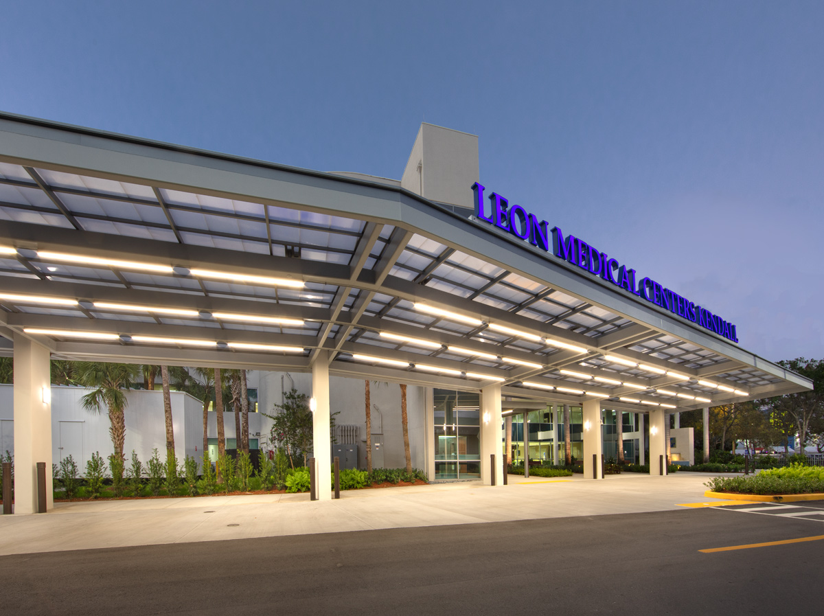 Architectural dusk view of the Leon Medical Center in Kendall, FL