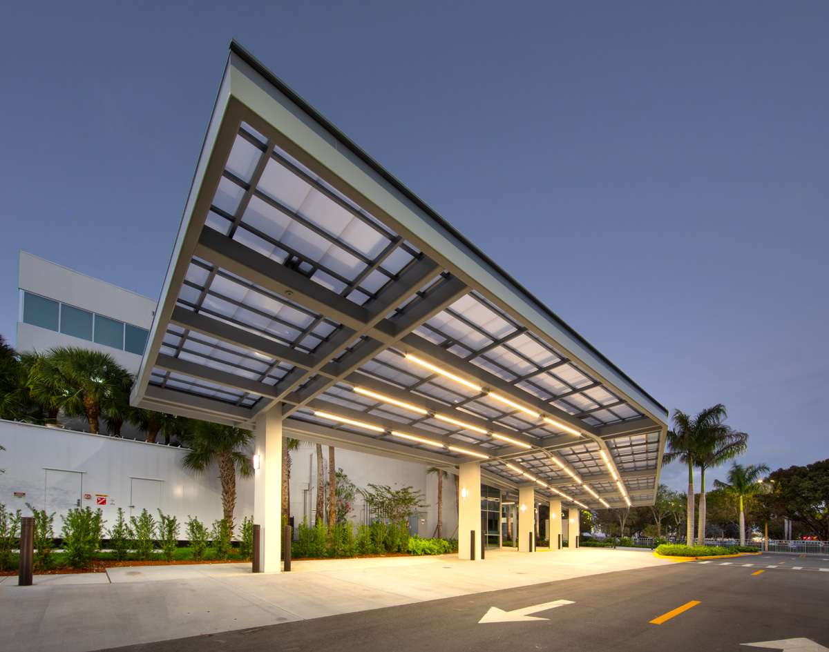 Architectural dusk view of the Leon Medical Center in Kendall, FL