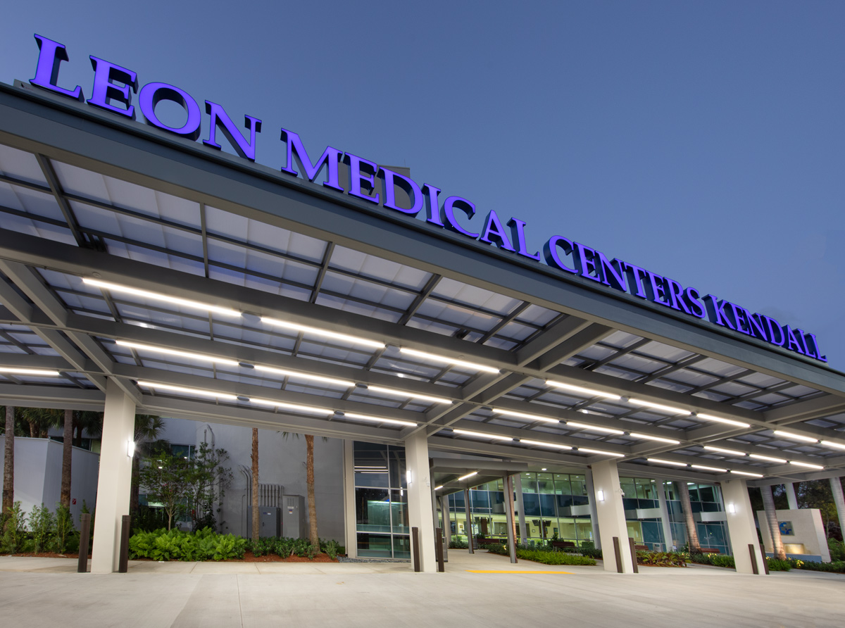 Architectural dusk view of the Leon Medical Center in Kendall, FL