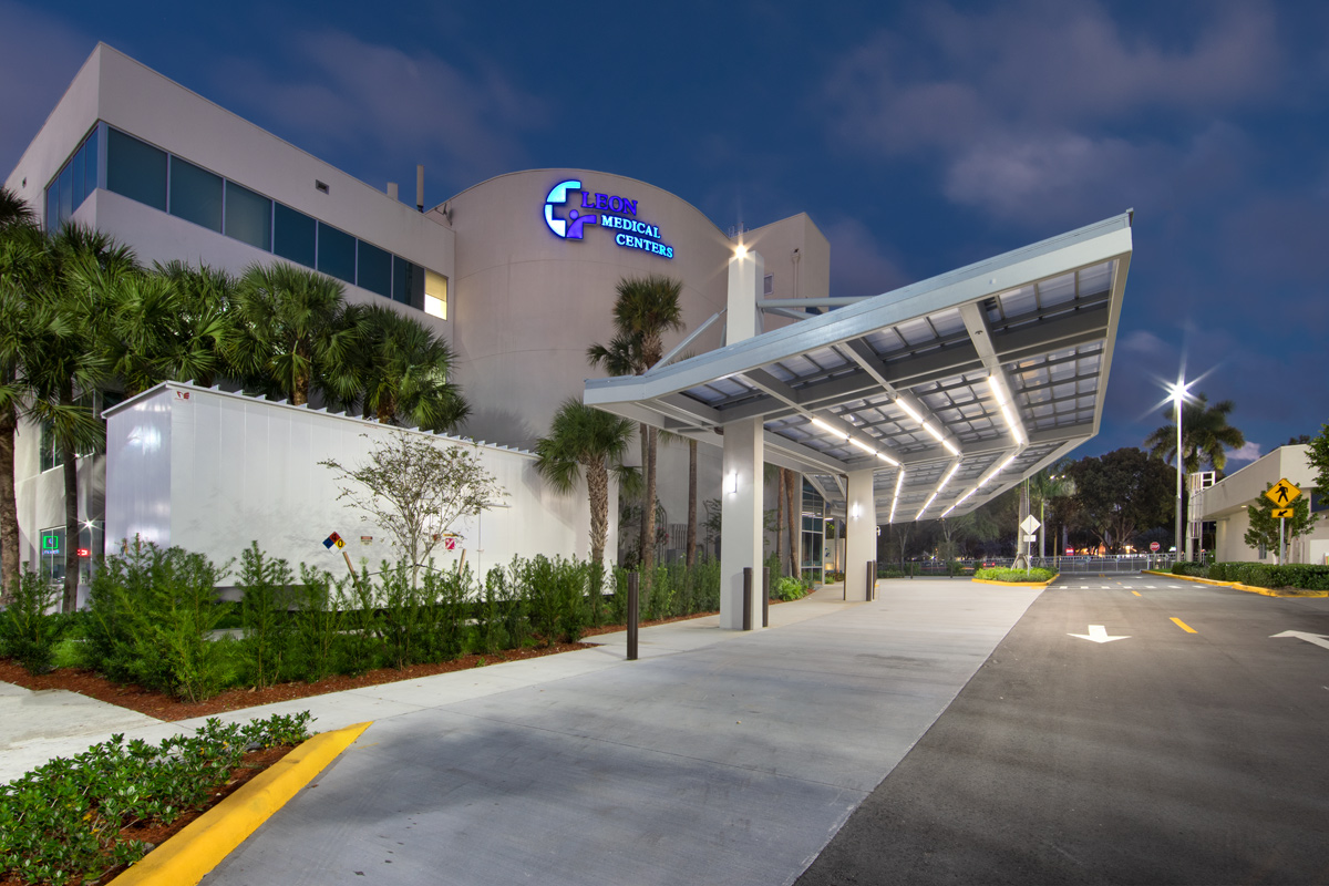 Architectural dusk view of the Leon Medical Center in Kendall, FL