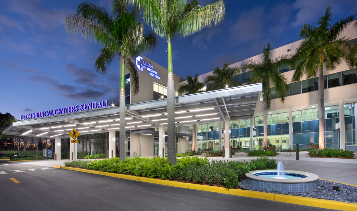 Architectural dusk view of the Leon Medical Center in Kendall, FL