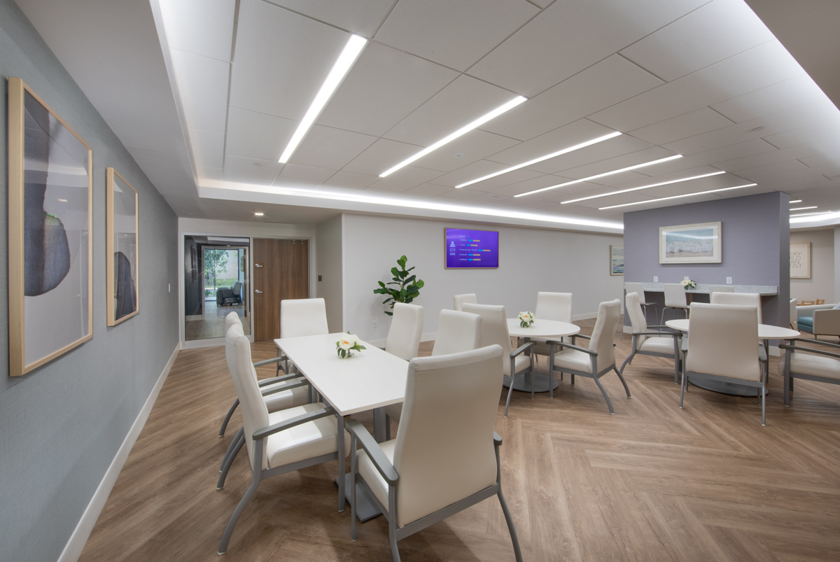 Interior design view of a lounge and dining at the Vitas Galloway Hospice, Miami, FL