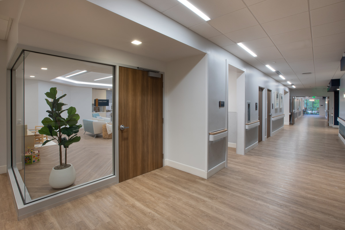 Interior design view of a corridor at the Vitas Galloway Hospice, Miami, FL