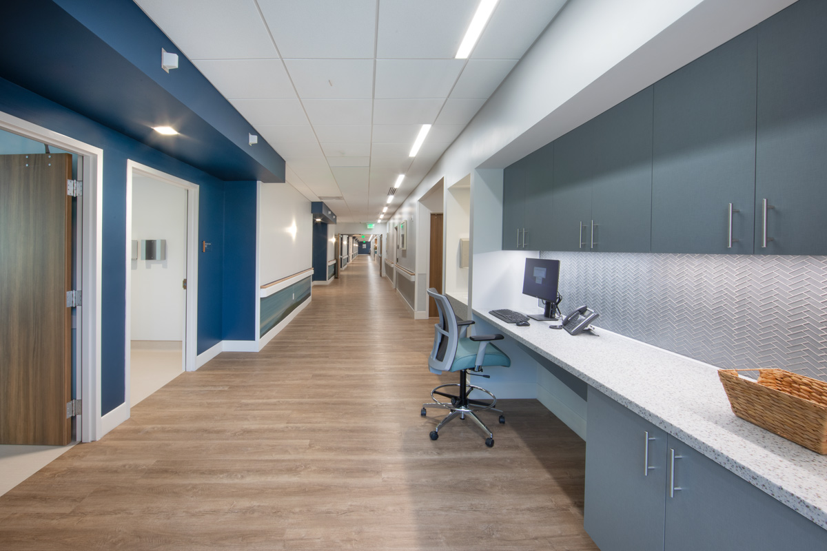 Interior design view of a corridor at the Vitas Galloway Hospice, Miami, FL