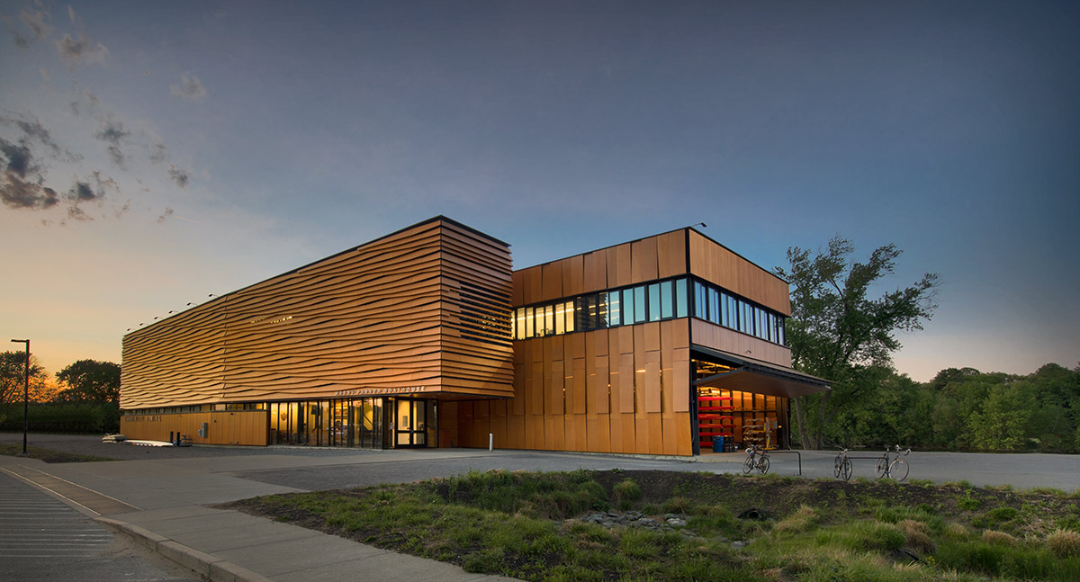 Architectural dusk view of the Harry Parker Boathouse in Brighton, MA.