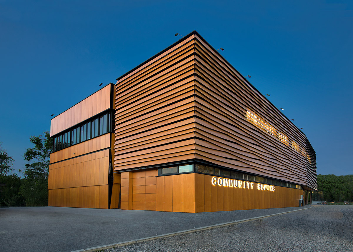 Architectural dusk view of the Harry Parker Boathouse in Brighton, MA.