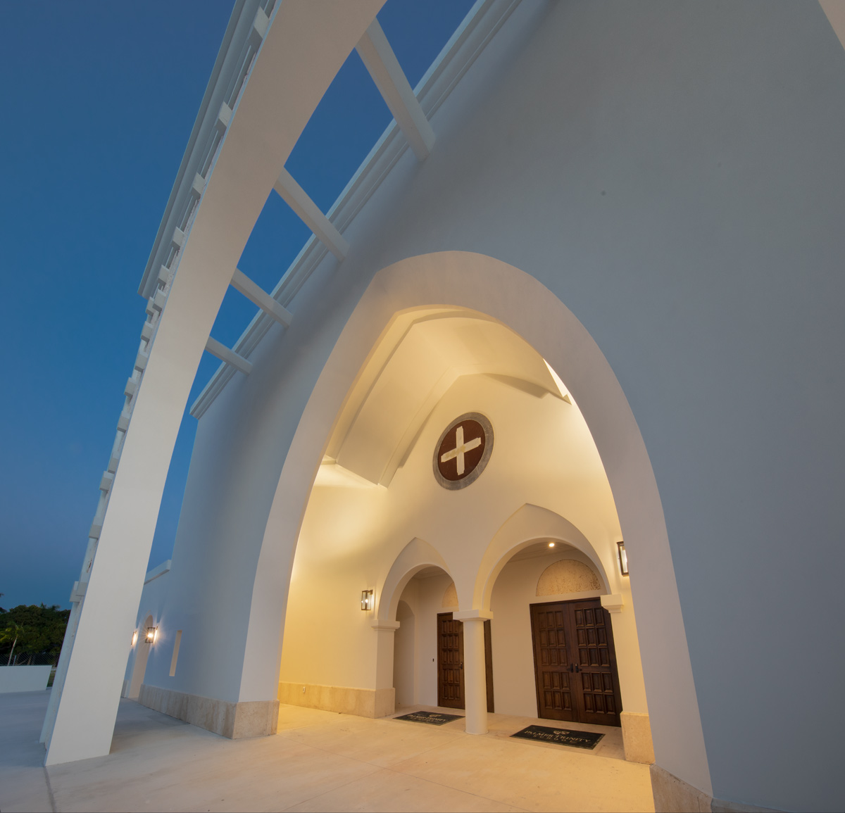 Architectural dusk detail view of the Palmer Trinity school chapel entrance in Miami, FL