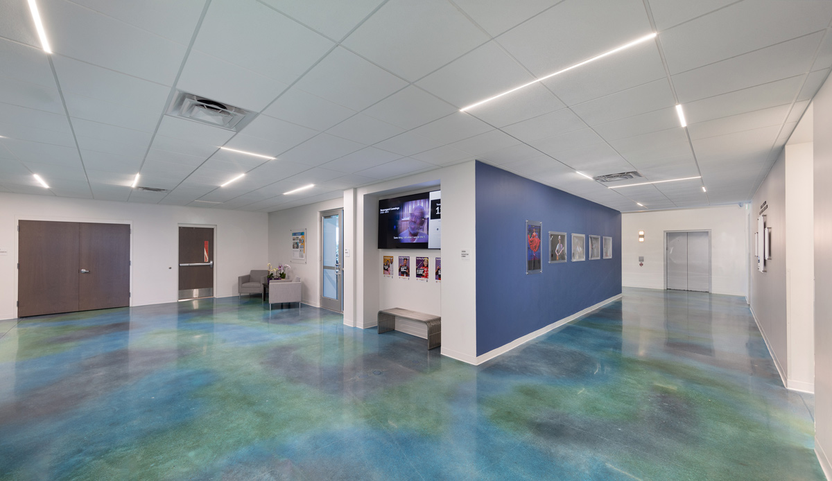 Interior design theater lobby view at the YMCA Mizell Community Center - Fort Lauderdale, FL