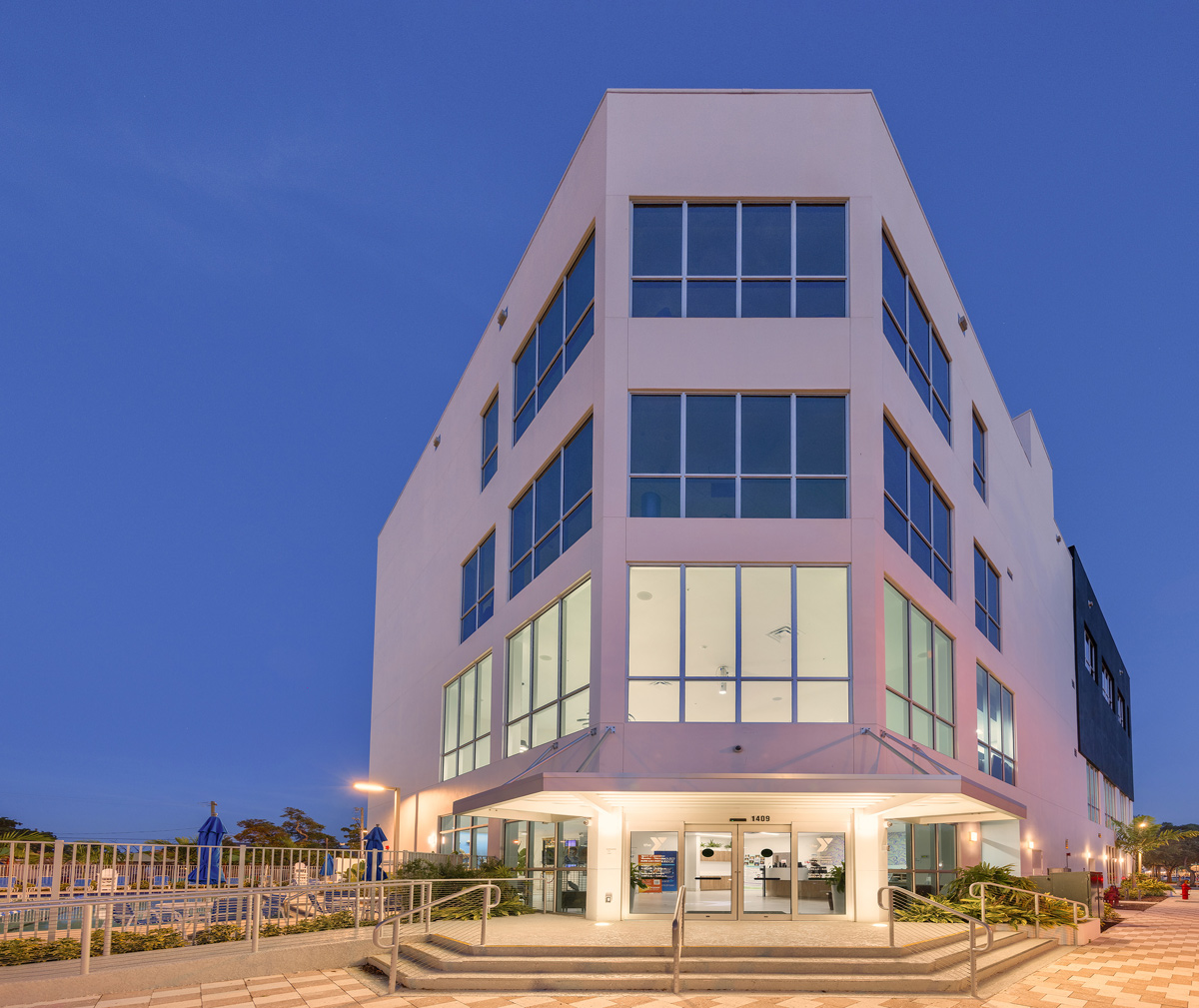 Architectural dusk view of the YMCA Mizell Community Center - Fort Lauderdale, FL