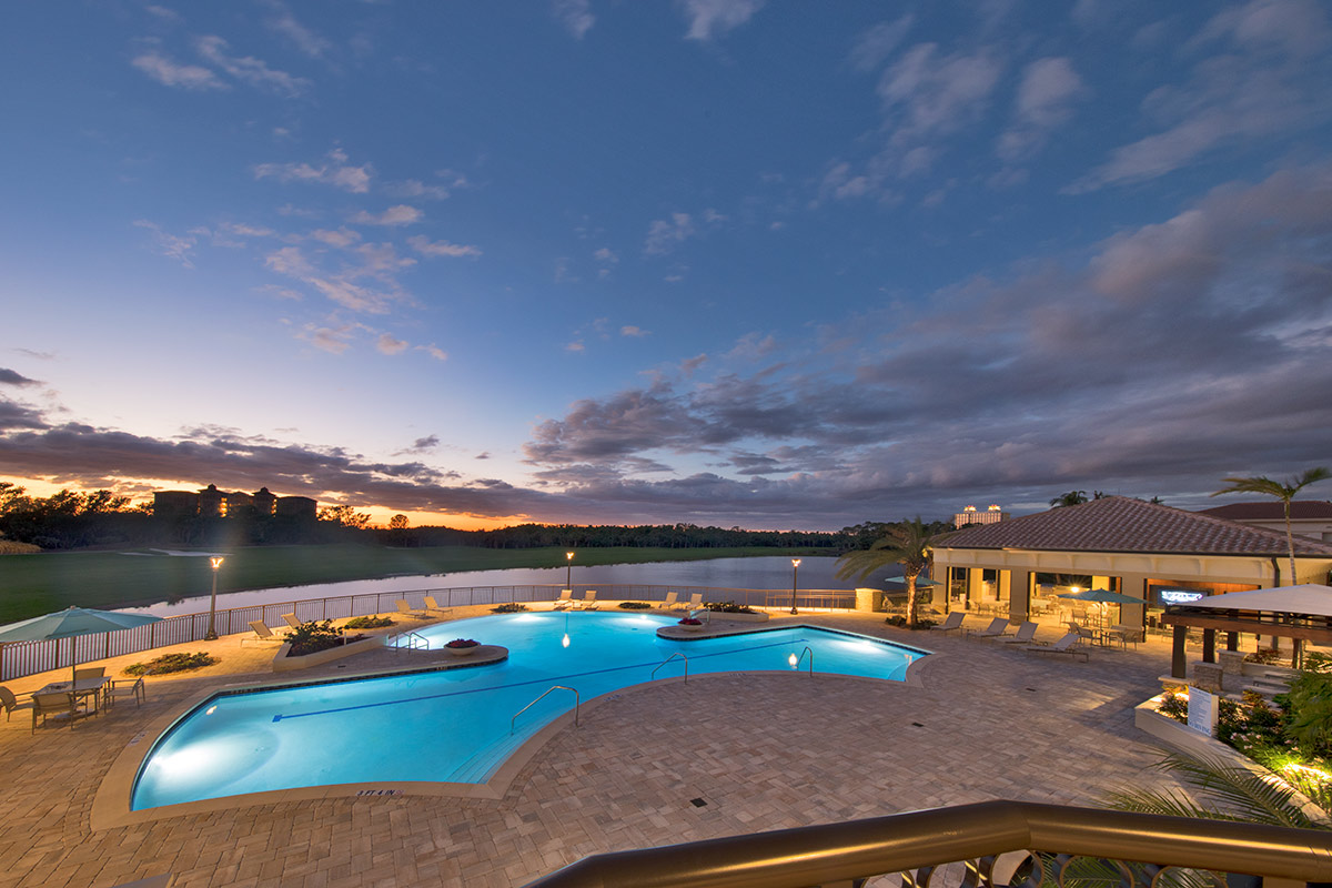 Architectural dusk pool view at the Altaira Condo - Bonita Springs, FL