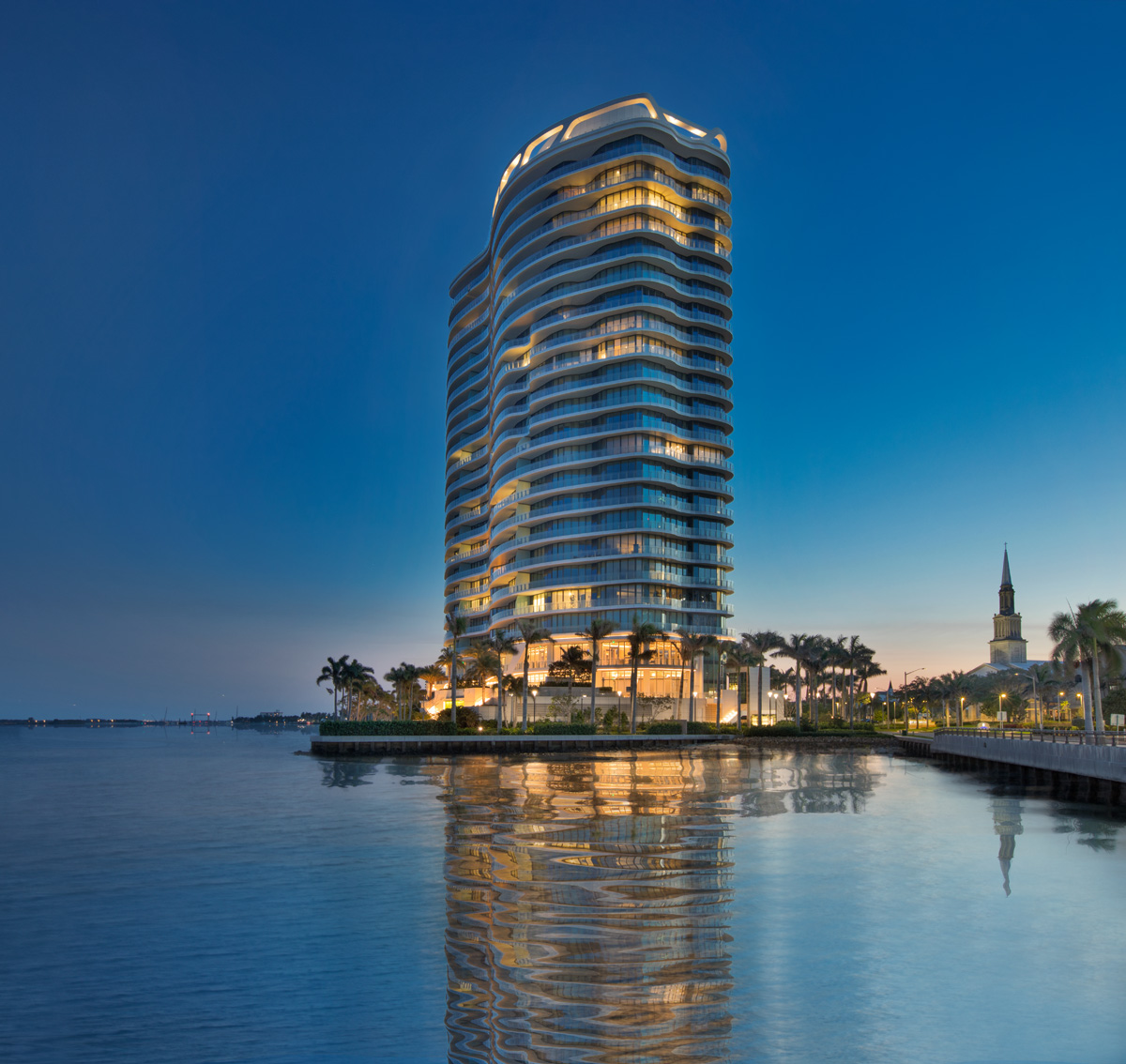 Dusk view of the Bristol luxury rental condominium located at the edge of the intercostal.