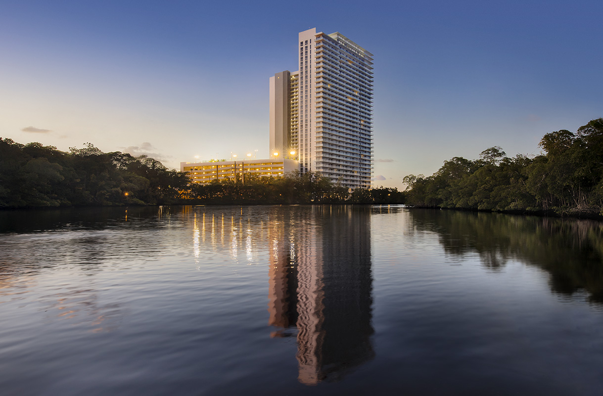 Architectural dusk view of the Harbour Condo Tower - North Miami Beach, FL