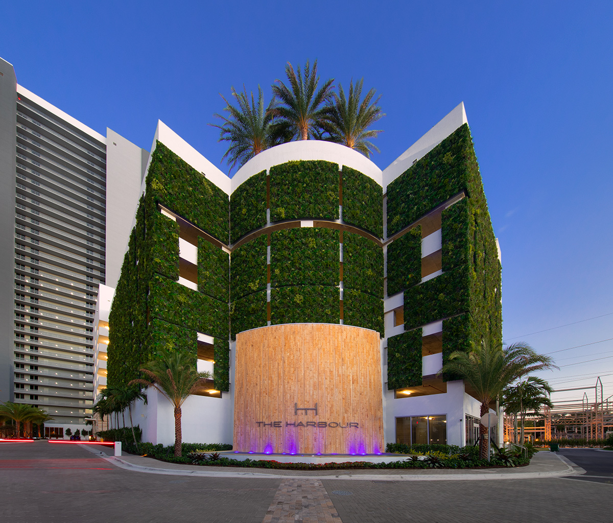 Architectural dusk view of the Harbour Condo Tower - North Miami Beach, FL