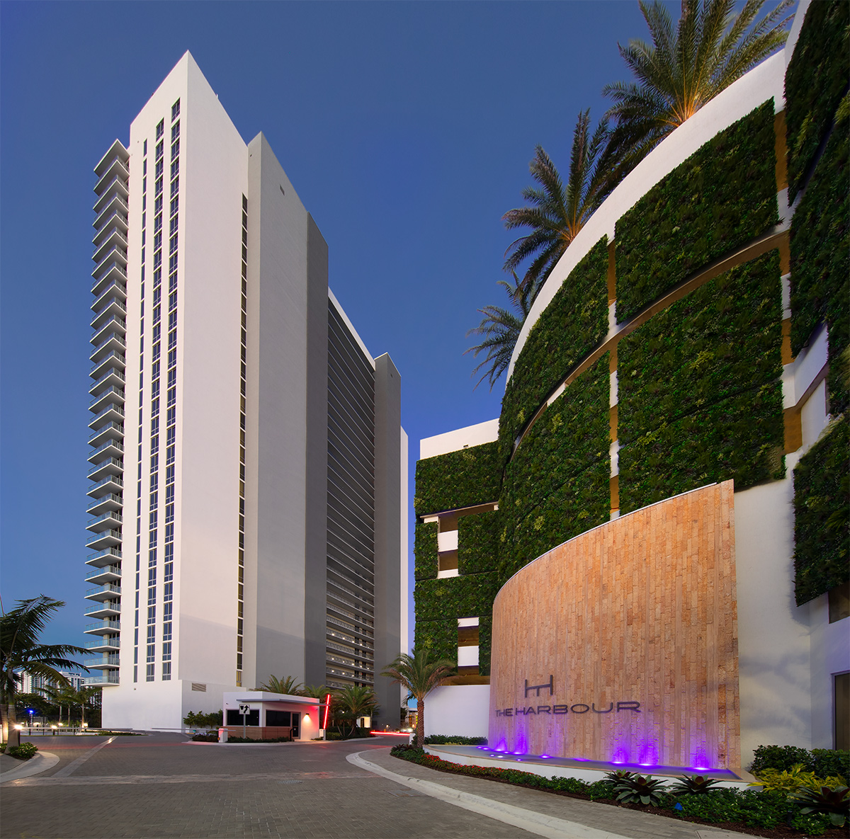 Architectural dusk view of the Harbour Condo Tower N Miami Beach, FL