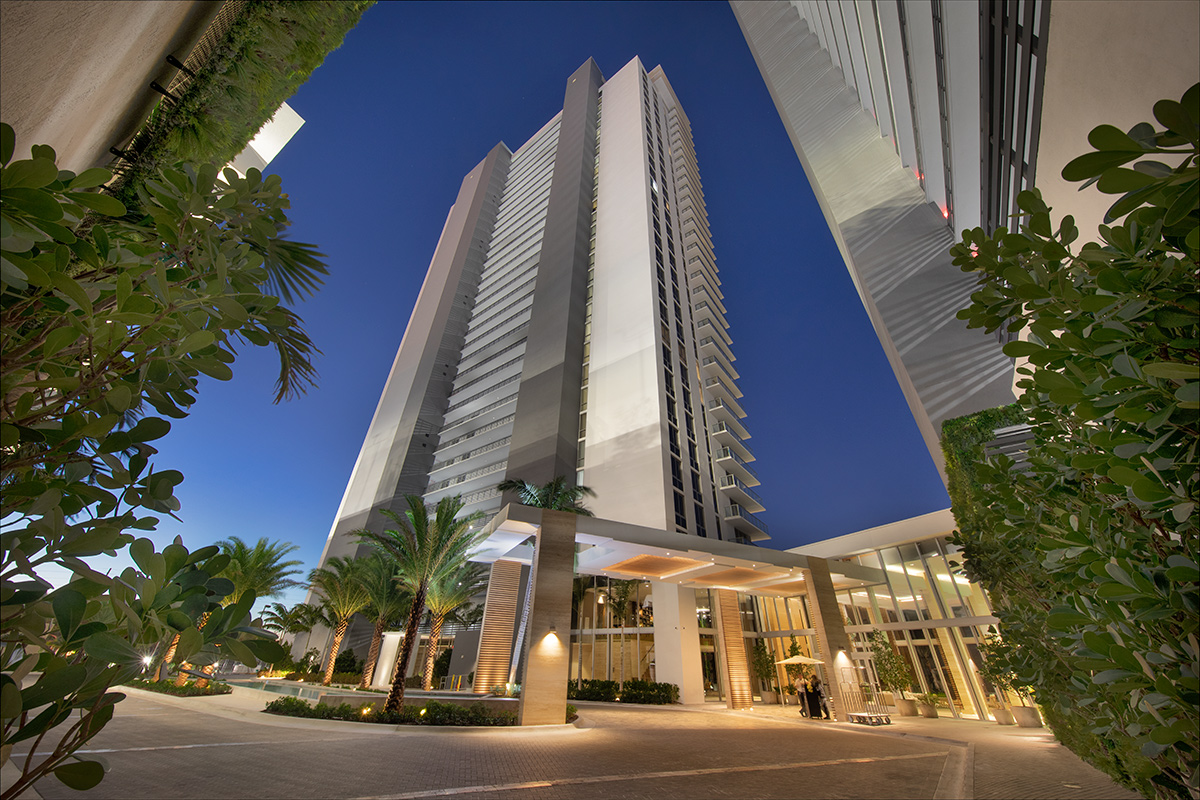 Architectural dusk view of the Harbour Condo Tower N Miami Beach, FL