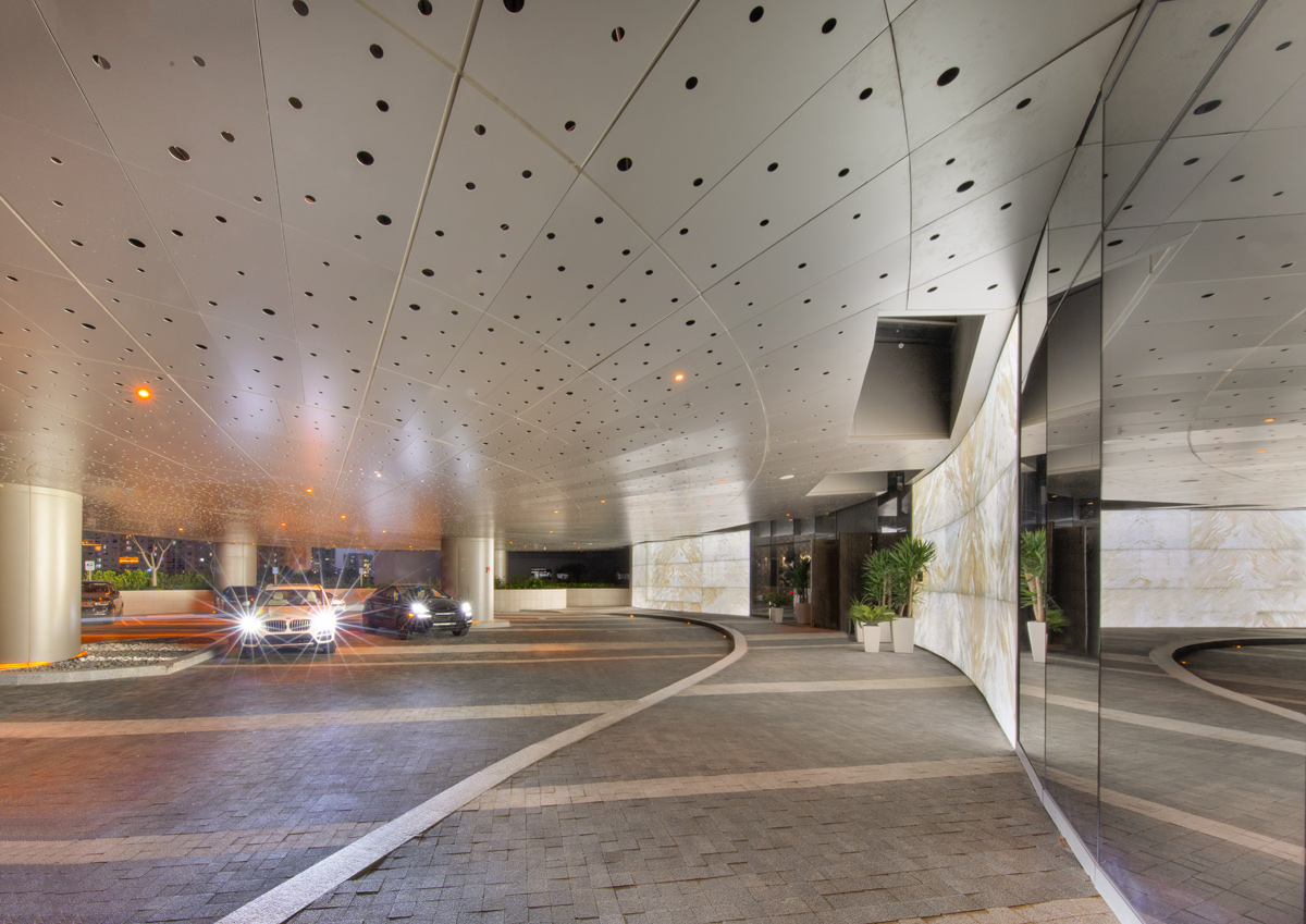 Entrance at dusk of the Ritz Carlton Residences in Sunny Isles Beach, FL