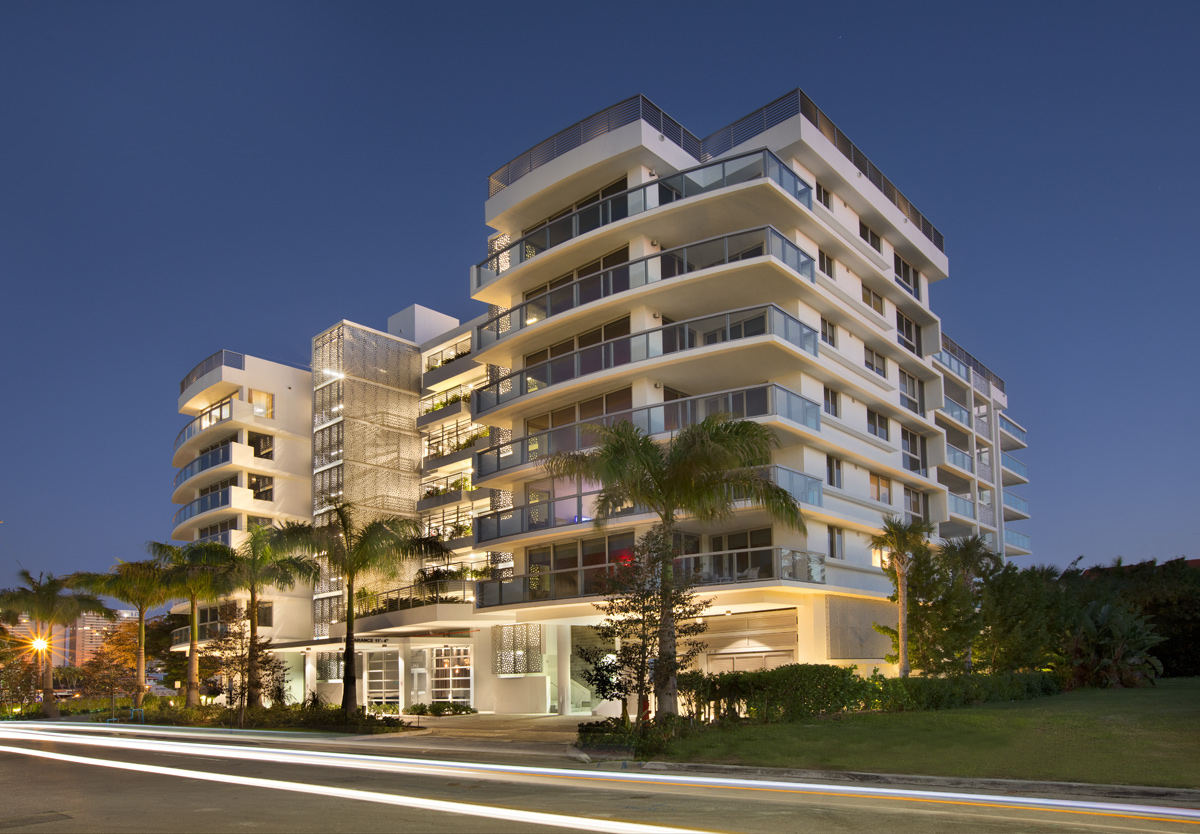 Bay Harbor One luxury condo architectural dusk view on Bay Harbor Island, FL.