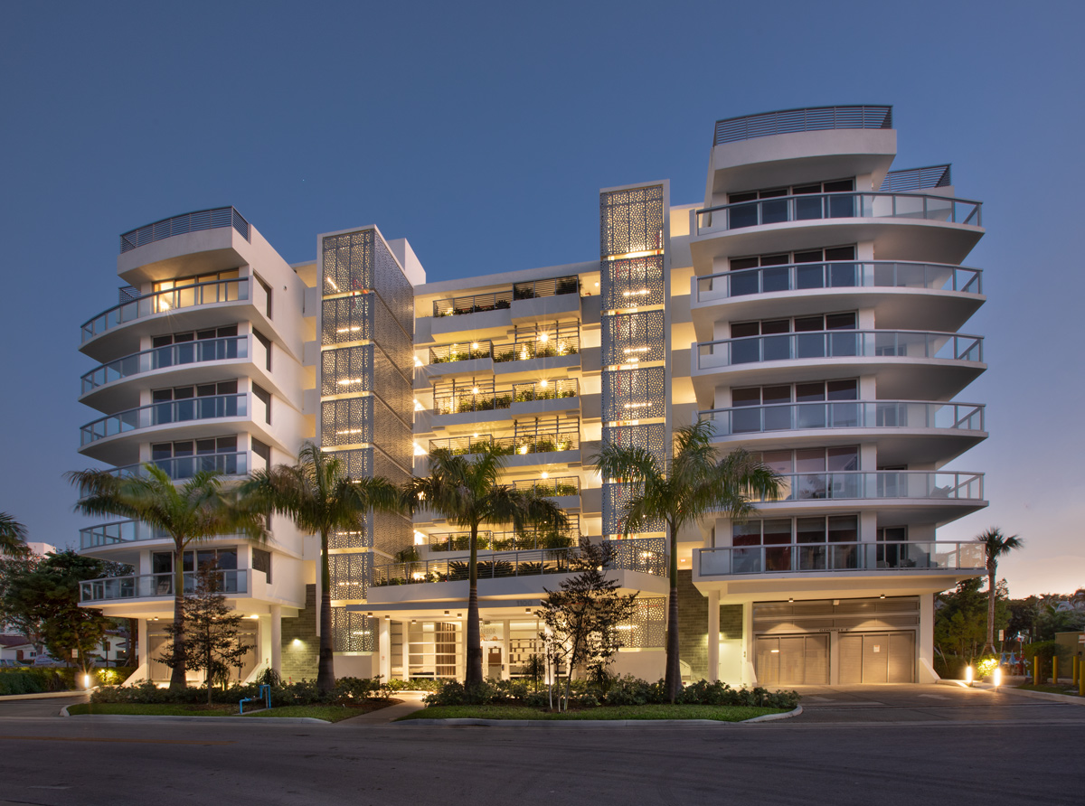 Bay Harbor One luxury condo architectural dusk view on Bay Harbor Island, FL.