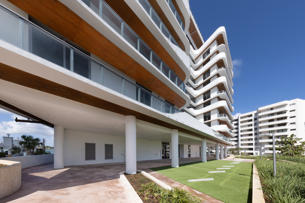 Architectural landscape view of Monaco Yacht Club condo in Miami Beach, FL.